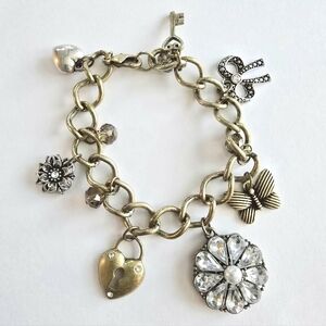 Charm bracelet gold and silver tone flower skeleton key bow feminine